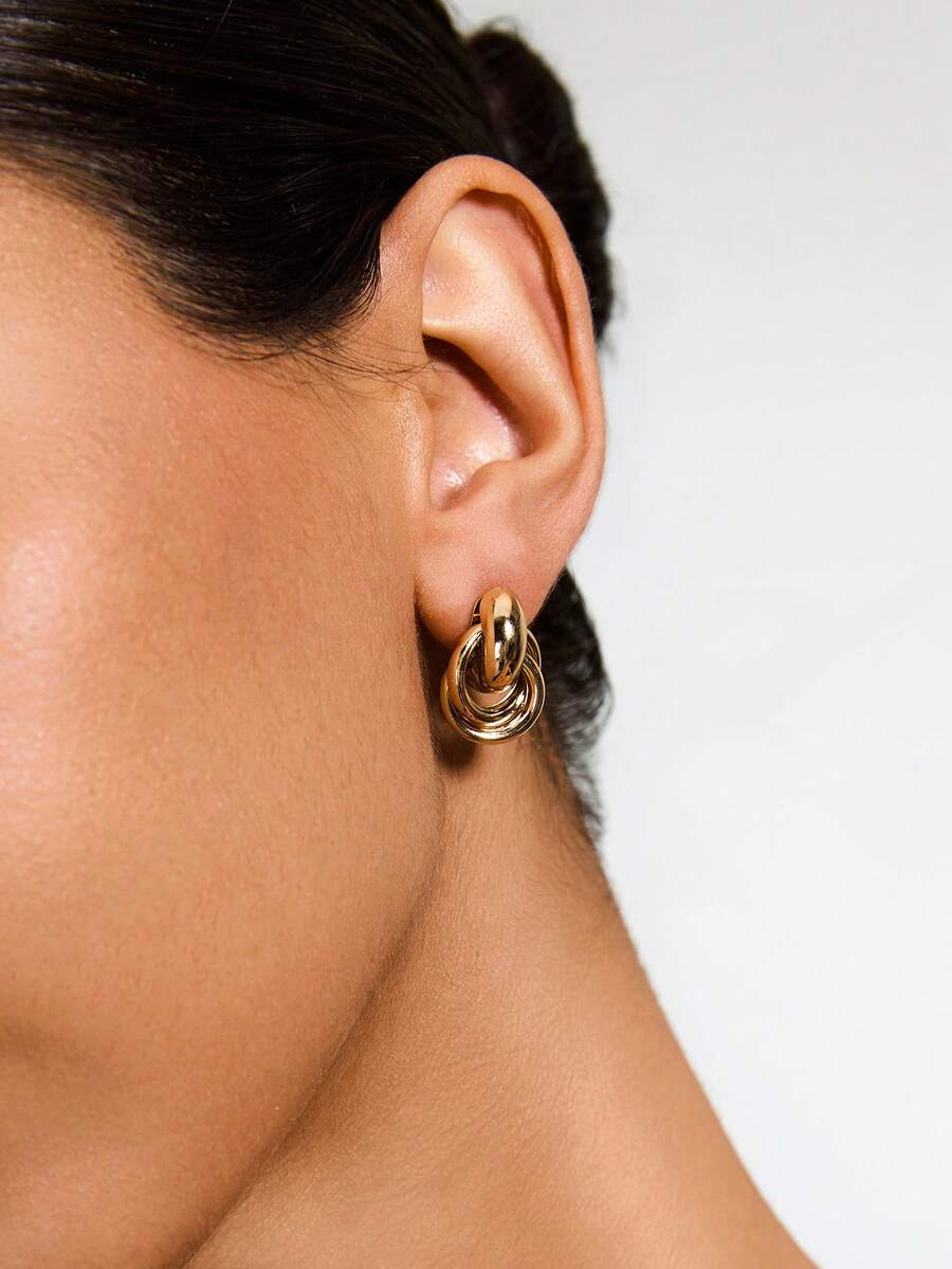 1 paire de boucles d'oreilles créatives en forme de cercle torsadé doré, design unique et simple, convient pour un port quotidien pour les femmes - Doré - Voir 1