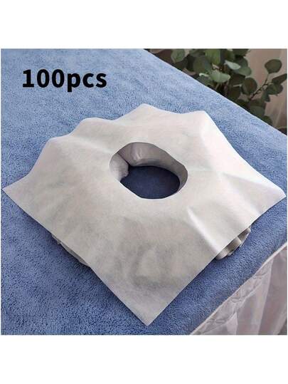100 chiếc khăn dùng một lần có lỗ tròn, dùng cho giường massage thẩm mỹ, được làm từ vải không dệt, được thiết kế để sử dụng như miếng lót mặt hoặc vỏ gối.