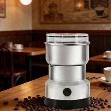 Este molinillo de café eléctrico monobloque de acero inoxidable cuenta con un molinillo de múltiples cuchillas, molienda de alta velocidad, encendido con un solo botón y puede utilizarse para moler especias, granos de café y polvos secos como el mijo. Ideal para cocinas domésticas, cafeterías y teterías. - Tipo de Enchufe A USA (110-127V) - Ver 5