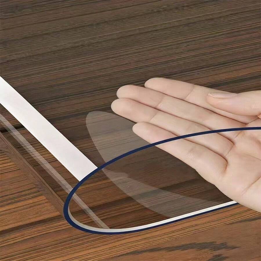 حصيرة طاولة شفافة من مادة PVC، وسادة مكتب، حصيرة أرضية مانعة للانزلاق، حصيرة حمام مقاومة للماء، مفرش طاولة مقاوم للزيت، غطاء طاولة شفاف للطعام، حصيرة مقاومة للحرارة، مناسبة للمنزل والفندق وطاولة الطعام والمكتب وطاولة القهوة وغرفة المعيشة ومكتب الكمبيوتر وأماكن أخرى. شفافة وواضحة، تحافظ على الجمالية الأصلية لسطح الطاولة، متينة ونظيفة وصحية.