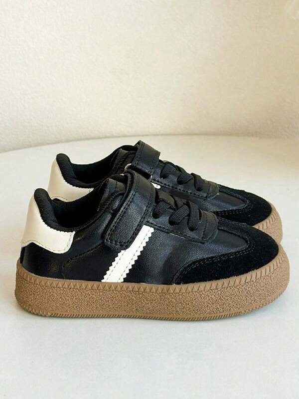Tenis infantiles retro de entrenamiento con rayas de contraste para niño y niña, cierre adhesivo ajustable suela gruesa de goma material PU resistente antideslizante cómodos