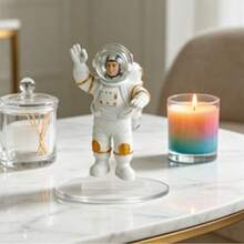 An Astronaut On The Desk, Waving In Front Of The Desk, The Warm Light Of The Desk Lamp And The Pages, Is A Gentle Encounter Between The Universe And The Daily Life. - 1PC - View 2