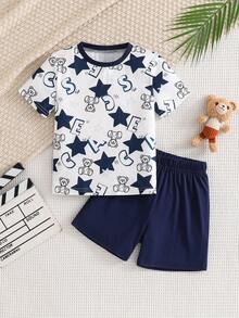 Bộ quần áo thường ngày 2 món mùa xuân/hè cho bé trai 4-7 tuổi, áo thun cổ tròn + quần short, thiết kế in chữ tương phản, chất liệu vải co giãn thoáng khí, dễ mặc, tối giản và thời trang, thoải mái và tiết kiệm, phù hợp cho mặc hàng ngày. - Màu xanh hải quân - Xem 1