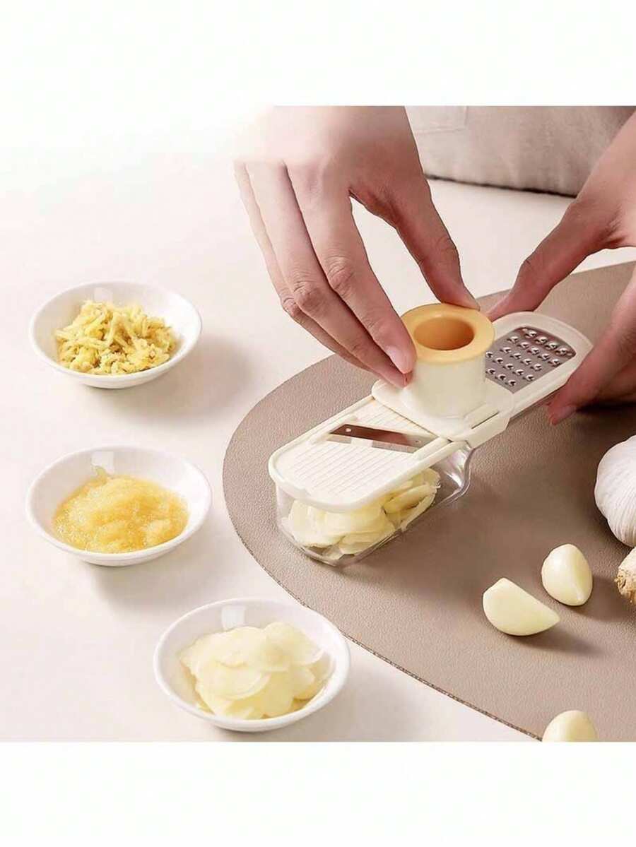 1 cái dụng cụ ép tỏi đa năng, 3 trong 1: máy băm tỏi, máy bào gừng có bảo vệ tay, hộp đựng đa năng dùng để bào tỏi, gừng và rau củ. - Nhiều màu - Xem 1