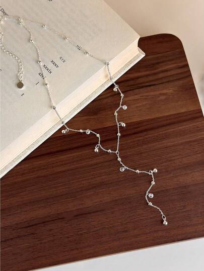 1 chiếc vòng cổ dài tua rua hình chuông sao lấp lánh, vòng cổ choker tối giản sang trọng, phụ kiện đa năng dành cho nữ.