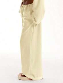 Pantalones de playa con efecto de lino con nudo delantero, elegantes para vacaciones de verano, casuales y bohemios, blancos, para aeropuerto y playa, para primavera y vacaciones - Crema - Ver 4