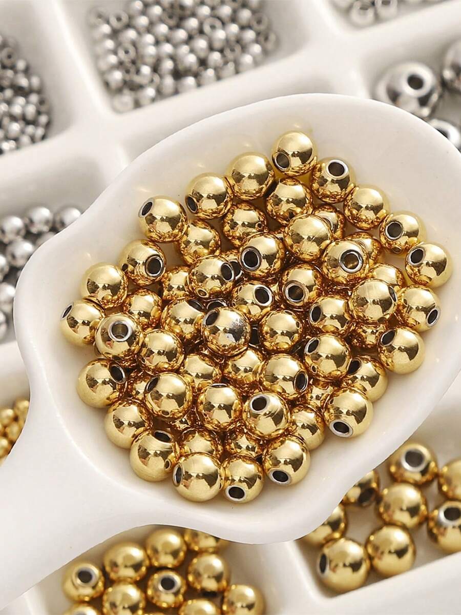 50 piezas de cuentas redondas de acero inoxidable 303#, cuentas espaciadoras sueltas de 2-10mm para accesorios de joyería DIY para pulseras y collares - Dorado - Ver 1