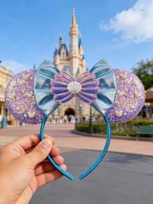 Disney 迪士尼爱丽儿亮片蝴蝶结米奇耳朵发箍，设计灵感源自卡通人物爱丽儿和米奇。这款可爱的卡通风格发箍非常适合女孩们进行角色扮演、参加化装舞会、主题公园游玩、节日庆典和社交聚会。它也是生日、圣诞节、周年纪念日和其他特殊场合的理想礼物。 - 彩色 - 查看 2