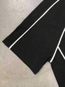 Áo thun nữ tay ngắn màu đen chất liệu cotton pha, in số 23 New York, sản xuất năm 2026, phù hợp cho người hâm mộ bóng đá tại Mỹ, Mexico, Canada, các giải vô địch bóng đá quốc tế, không khí bóng đá, trang phục thể thao thường ngày, ngày thi đấu, mùa bóng đá, phong cách thể thao mùa hè. - màu đen - Xem 4