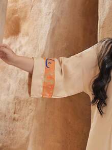 Đầm thêu kiểu Ả Rập thanh lịch, đầm JALABIA cổ tròn thời trang duyên dáng tay lỡ màu mơ, đầm thời trang nữ xuân hè 2026, trang phục truyền thống Eid Al-Adha. - trái cam - Xem 7