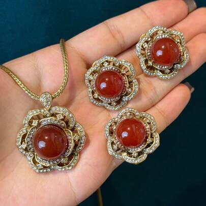 Conjunto de joyería de collar, aretes y anillo con corona floral redonda, con piedra natural de ágata roja falsa incrustada de cristal, en tono dorado de 18K con acabado de cobre vintage desgastado, para uso diario de mujer