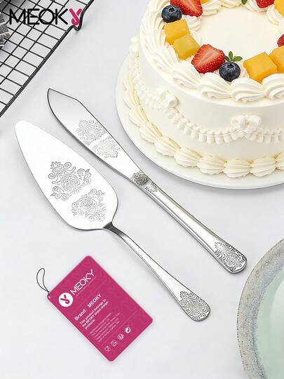 Với họa tiết hoa tinh tế và chất liệu thép không gỉ bền chắc, sản phẩm này phù hợp để cắt bánh cưới có hoa, phục vụ trong các bữa tiệc, và cũng có thể được sử dụng như dao cắt bánh mì, xẻng pizza và kẹp bánh ngọt. Dễ dàng vệ sinh, chống gỉ và bền bỉ, đây là lựa chọn lý tưởng cho việc làm bánh tại nhà, cửa hàng tráng miệng, tiệc nhà hàng và các lễ hội. Một sự lựa chọn cắt gọt thiết thực dành cho những người đam mê làm bánh.