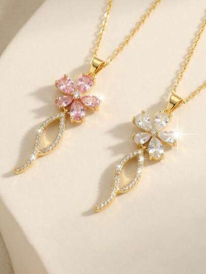 两件套女士镀金项链套装，饰有精致花朵吊坠，搭配马眼形切割粉色翡翠和透明立方氧化锆光环设计，优雅简约，适合日常佩戴、办公场合、派对、情人节、生日、周年纪念日等场合，是送给妈妈、女友、妻子的理想礼物。