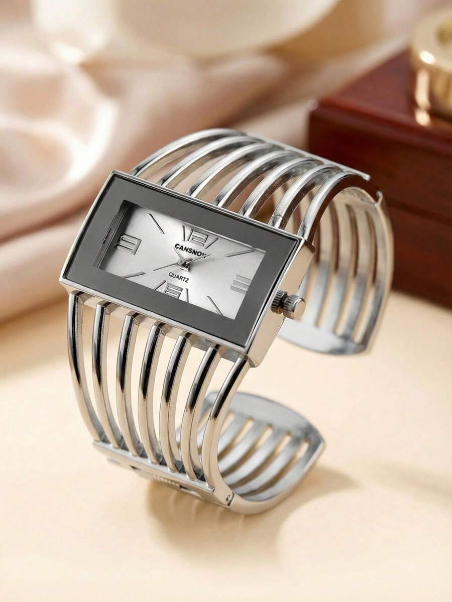 1 chiếc đồng hồ đeo tay nữ cao cấp, đồng hồ đeo tay thạch anh hình chữ nhật màu bạc, đồng hồ thời trang nữ nổi bật, đồng hồ đeo tay mặt trắng mạ vàng kiểu dáng hở, đồng hồ nữ thanh lịch khoét rỗng, đồng hồ đeo tay thạch anh tinh tế, đồng hồ hình chữ nhật phong cách thương hiệu cao cấp, đồng hồ đeo tay kiểu dáng hở thời trang, đồng hồ thạch anh nữ trang trọng, món quà lý tưởng cho Ngày của Mẹ, sinh nhật, bạn bè, gia đình, đồng hồ hình chữ nhật vàng quyến rũ, phù hợp cho hẹn hò, tiệc tùng, du lịch, đi chơi hàng ngày, đồng hồ đeo tay nữ thanh lịch nổi bật.