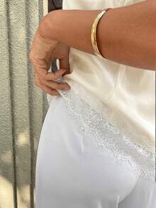 女士性感休闲吊带无袖背心，网纱不对称下摆缎面吊带衫，适合夏季夜间约会、度假、单身派对和生日派对。 - 米白色 - 查看 8