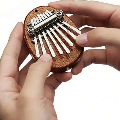 Đàn piano ngón tay cái 8 nốt, bàn phím mini cầm tay chất lượng cao, quà tặng tiệc tùng di động phù hợp cho người từ 14 tuổi trở lên. Không cần nguồn điện, lý tưởng cho gia đình, nhà bếp và các bữa tiệc lễ hội.
