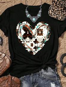 Camiseta negra de mujer de manga corta con corazón blanco y textura tipo cow print en marrón, contorno azul y detalles desgastados, estampado termotransfer - Negro - Ver 1