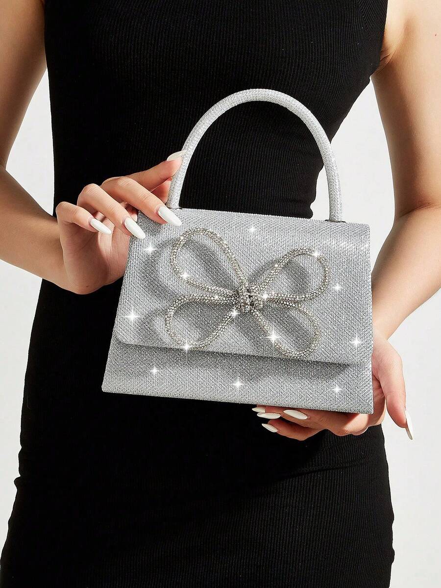 REMANLAND Bolso de mano con lazo de cristal plateado brillante de lujo, completamente cubierto con textura de cristal brillante, decoración de lazo de cristal 3D, diseño de asa único. El centro de atención en fiestas y eventos nocturnos, también una opción de regalo perfecta. - Plateado - Ver 1