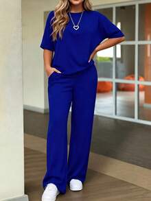 2 pezzi/set Completo casual da donna, composto da top a maniche corte a girocollo in tinta unita e pantaloni lunghi con tasche in vita, elegante per l'estate - Blu - Visualizzare 2