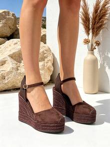 Women's High Wedge Espadrilles For The Beach, Vacation, And Party. High-Quality Women's Wedge Sandals With A Bohemian-Style Esparto Sole For Summer. Comfortable And With An Heel Height, Ideal For Walks And Outdoor Activities. Elegant And Fresh Footwear Option. - Brown - View 1
