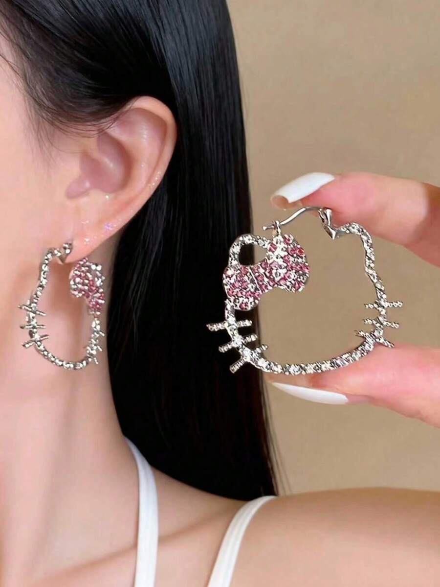 1 pieza Pendientes cristalinos huecos súper brillantes de Hello Kitty de Sanrio, dulces y de moda, de alta gama y elegantes - Rosa - Ver 1