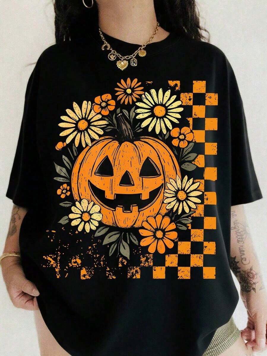 Camiseta vintage con diseño de calabaza del diablo de Halloween, con temática de "Pesadilla antes de Navidad", de corte holgado y cuello ancho de manga corta para mujer - Negro - Ver 1