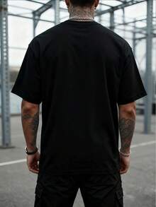 Estilo Alternativo Camiseta de Manga Corta Hombre con Estampado de Cráneo Formado por Múltiples Máscaras de Lucha Libre Coloridas, Diseño Creativo y Vibrante Corte Amplio Ideal Amantes del A - Negro - Ver 3
