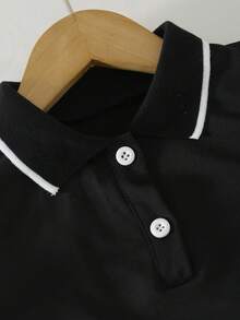 Bộ đồ thể thao mùa hè cho bé gái gồm áo croptop không tay cổ polo và chân váy xếp ly in hình trái tim cạp chun. - màu đen - Xem 6
