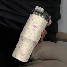 1个900毫升（33.44盎司）不锈钢杯，带手柄和吸管，可爱蝴蝶结和爱心设计，双吸嘴可保温保冷，非常适合居家、办公、户外使用，也是送给朋友、生日或圣诞节的理想礼物。 - 星星 - 查看 2