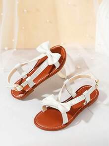 1 par de sandalias blancas para niñas, nuevos zapatos de princesa con moño, diseño de banda elástica, suela blanda, zapatos casuales de playa para niñas, adecuados para uso en verano - Beis - Ver 2