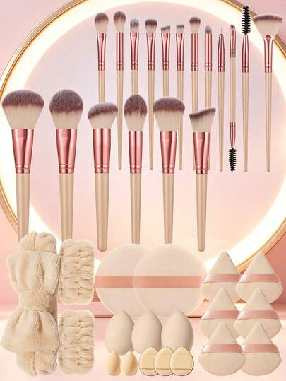 Bộ dụng cụ trang điểm 37 món bao gồm: 18 bộ cọ trang điểm + 3 bông mút trang điểm + 2 bông mút trang điểm mini + 2 bông phấn tròn + 6 bông phấn tam giác + 3 bông phấn dạng cushion mini + 2 dây đeo cổ tay + 1 băng đô cài tóc