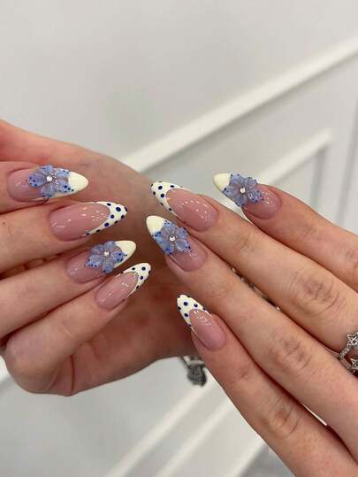10 piezas de uñas postizas cortas con forma de almendra hechas a mano, manicura francesa en color amarillo nude, uñas de estilo dulce de chica de verano fresco con puntas francesas pintadas a mano con lunares amarillos y decoración de flores azules de cristal 3D, efecto de gelatina translúcida, versátil para cualquier ocasión, incluye herramientas de manicura para una fácil aplicación y eliminación, adecuado para mujeres y niñas