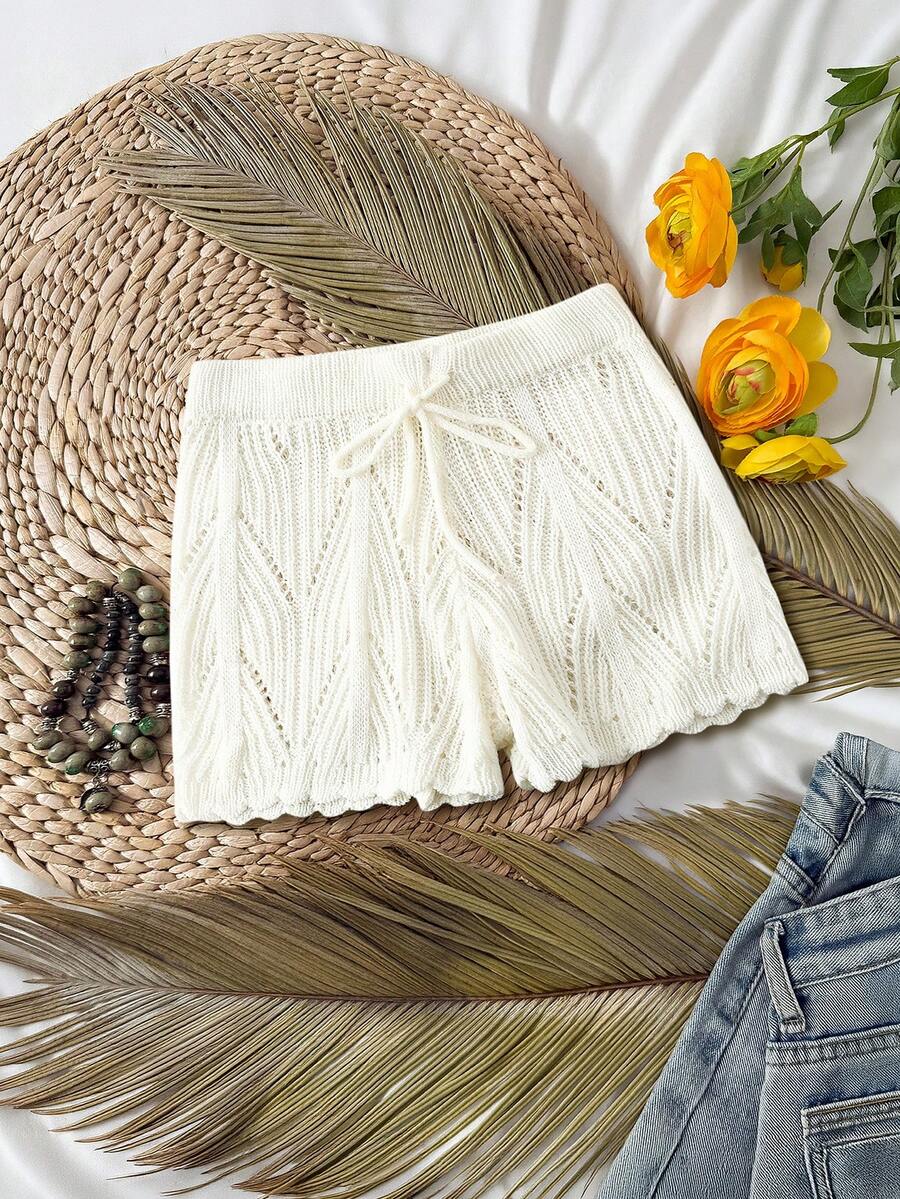 Quần short nữ mùa hè kiểu dáng thường ngày, chất liệu dệt kim, khoét lỗ, cạp chun, gấu quần lượn sóng, thích hợp mặc đi biển hoặc đi nghỉ mát. - trắng - Xem 1