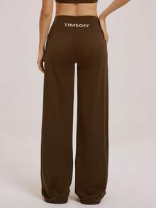 TimeOff Women's One Set Solid Color V-Neck Spaghetti Strap Sports Bra & Criss-Cross Waist Letter Print Straight Leg Pants Set - Brown - View 8