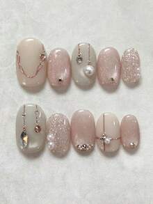 Bộ 10 miếng dán móng tay hình bầu dục ngắn, thủ công tinh tế, phong cách Y2K màu hồng pastel và trắng ngà bóng bẩy, hiệu ứng mắt mèo, đường viền kim loại vàng hồng, điểm xuyết ngọc trai và đá Cubic Zirconia, phụ kiện trang sức móng tay sang trọng dành cho người đi làm. - Nhiều màu - Xem 6