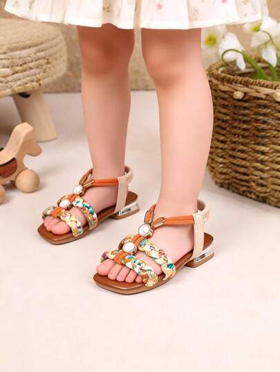 1 par de sandalias de princesa de estilo europeo y americano para el verano, zapatos de playa de suela blanda y antideslizante para niñas, zapatillas de tacón bajo con decoración de diamantes de colores trenzados para niños y niñas, adecuadas para la escuela, actividades al aire libre y uso diario