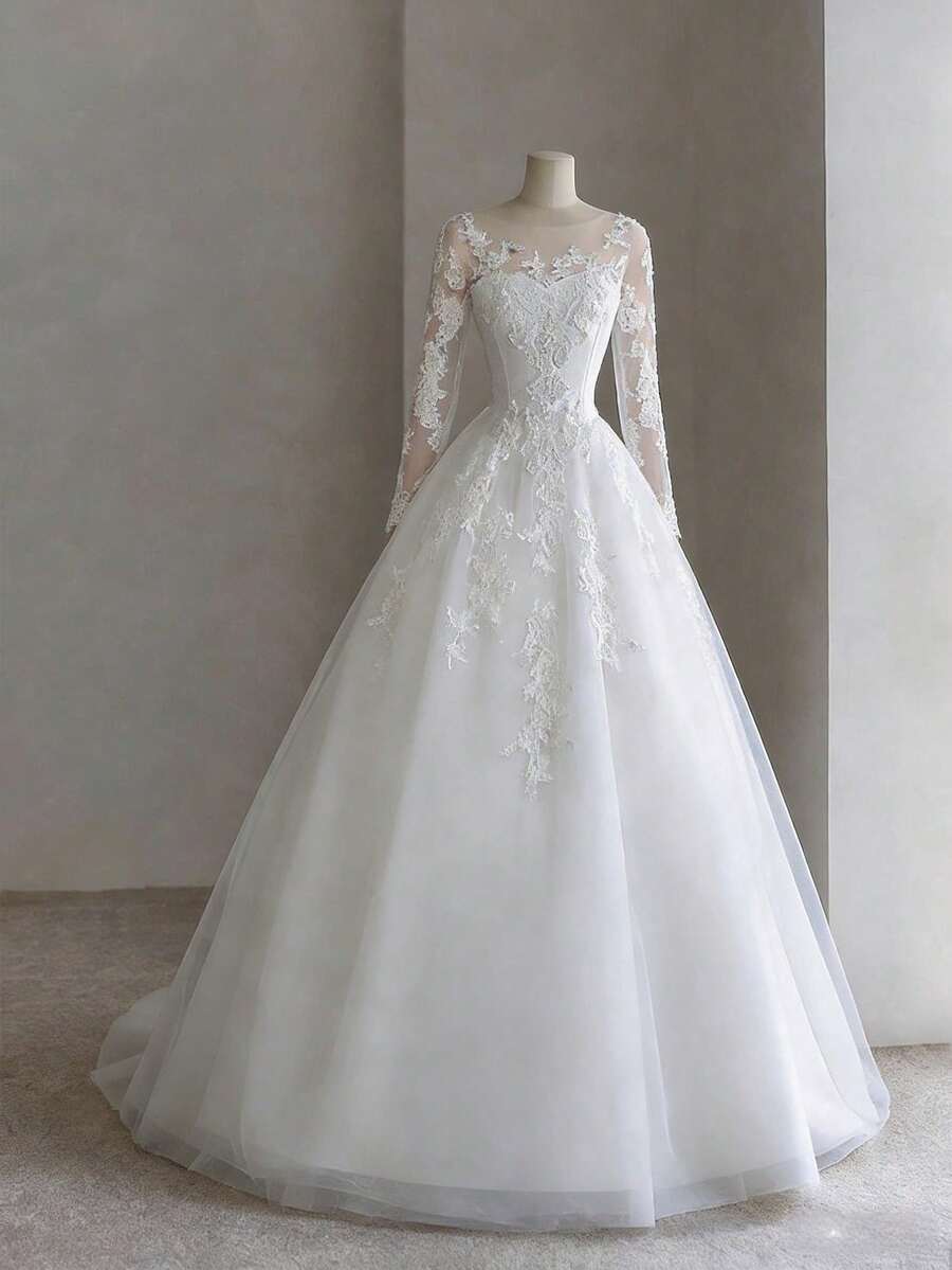 Elegant High Neck A-Line Wedding Dress With Long Sleeves And Lace Trim In Organza – Sophisticated Floor-Length Bridal Gown Featuring A Delicate Round Neckline, Full-Length Fitted Sleeves, Intricate Lace Insets, And Structured Organza Silhouette, Perfect For Weddings, Christmas Galas, Halloween Balls, Formal Dances, Birthday Celebrations, And Special Evening Events. A Timeless Choice For Wedding Receptions, Holiday Parties, Anniversary Dinners, Resort Getaways, Black-Tie Occasions, Cocktail Gatherings, Bridal Showers, Wedding Guest Attire, Graduation Formals, Homecoming Events, And As A Refined Bridesmaid Or Festive Evening Gown. - trắng - Xem 1