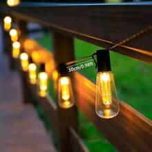 一套太阳能户外串灯，20颗LED复古S14灯泡，防震吊灯，适用于花园、婚礼、派对、户外酒吧、露台、栅栏、树木、泳池装饰、万圣节、圣诞节等场合。 - 暖光 - 查看 12