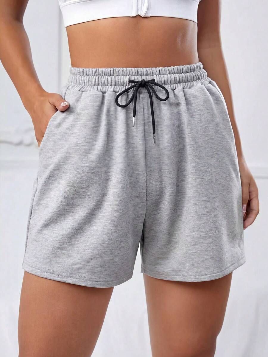 Quần short nữ dáng rộng thoải mái, màu trơn, thích hợp cho chạy bộ và thể thao mùa hè, cạp chun có dây rút, ống quần suông mỏng, phù hợp cho tập thể dục hàng ngày, chạy bộ và các hoạt động thể thao. - Màu Xám nhạt - Xem 1