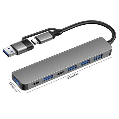 XIAVEN 7 合 1 双输入连接扩展坞，这款 7 端口 USB-C DEMKICO 扩展坞可立即扩展您设备的功能。它采用双输入设计，可通过原生 USB-C 接口连接，或使用随附的 USB-A 转 USB-C 适配器连接 USB-A 端口。该扩展坞提供：1 个 USB 3.0 端口、4 个 USB 2.0 端口和 2 个 USB-C 数据端口。