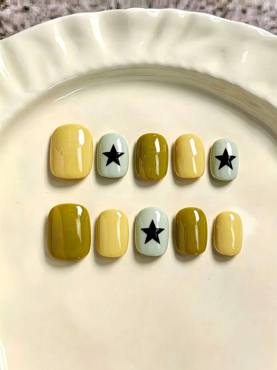 10 móng giả vuông ngắn, màu vàng pastel, xanh gừng, xám nhạt với họa tiết ngôi sao đen vẽ tay, thiết kế tối giản, móng giả gắn bằng áp lực, màu sắc tương phản độ bão hòa thấp, đa năng cho đi làm hàng ngày, đi học, tốt nghiệp, công sở, thường ngày, hẹn hò, tụ họp, phong cách đường phố - lấy cảm hứng từ Hàn Quốc. - màu xanh lá - Xem 1