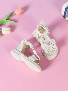 2026 Nouvelles sandales de princesse à papillon de perle à la mode pour filles, design à bride de cheville avec nœud papillon ajouré, semelles souples antidérapantes avec garniture de perles. Convient aux tout-petits, à la maternelle, aux fêtes d'anniversaire, aux représentations, à la plage et autres occasions. Sandales romaines de style fée douce - Blanc - Voir 6