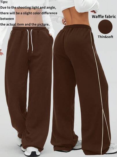 1 chiếc quần jogger nữ dáng rộng, chất liệu vải kẻ ô, có túi và thiết kế phối màu tương phản, ống quần thẳng, thích hợp cho chạy bộ ngoài trời, tập gym, mặc thường ngày, phù hợp cho mọi mùa xuân.