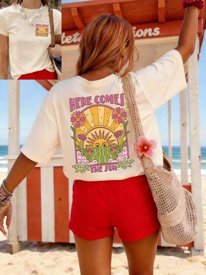 一款休闲女式夏季上衣，采用波普艺术风格，双面印花设计，饰有太阳和花卉图案，并印有“太阳来了”字样；短袖圆领T恤。