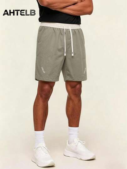  AHTELB Men's Summer Sports Shorts, Thin Breathable Quick-Dry Loose Fit Bermuda Shorts, Contrast Color Waistband With Drawstring, Letter Print Quick-Dry Sports Casual Bermuda Shorts, Suitable For Outdoor Hiking, Running And Daily Commute, Men's Clothing