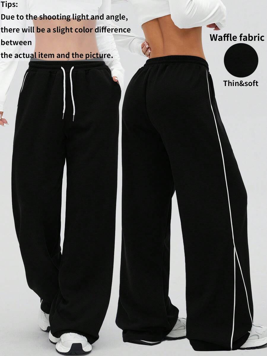 1 pieza Pantalón jogger holgado con textura de gofre, con bolsillos y diseño de rayas laterales en contraste, pierna recta, adecuado para correr al aire libre, entrenamiento en el gimnasio, uso casual, todo el año, color negro primaveral