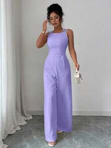 El mono de pierna ancha Elezga Elegante, con decoración de lazo en los hombros y estampado floral de margaritas en tela de brocado, es adecuado para el uso diario. - Morado - Ver 7