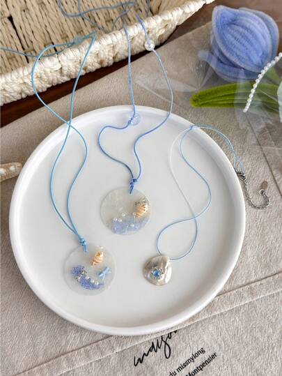 1 chiếc vòng cổ điều chỉnh được làm từ vỏ sò tự nhiên, dây thừng bện thủ công, dây chuyền ngọt ngào ôm sát xương quai xanh, phong cách nghỉ dưỡng biển.