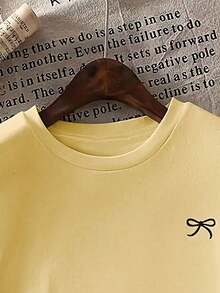Camiseta de manga corta holgada con estampado de lazo y hombros anchos, casual, negra, de verano - Amarillo - Ver 4