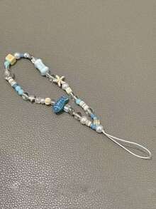 1 pieza Cordón para teléfono hecho a mano con cuentas de pez y estrella de océano azul, accesorio de encanto para teléfono fresco - Celeste - Ver 5